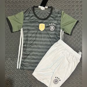 Beautiful brand new Germany kids soccer fan set (jersey + short)